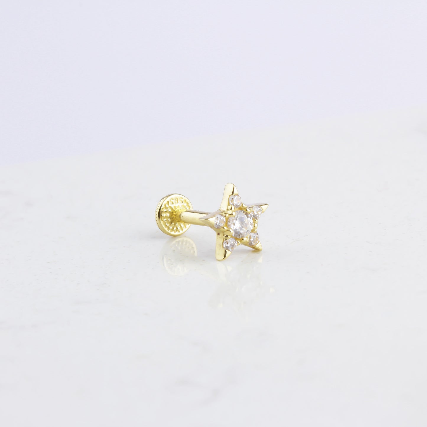 STAR TRAGUS PIERCING