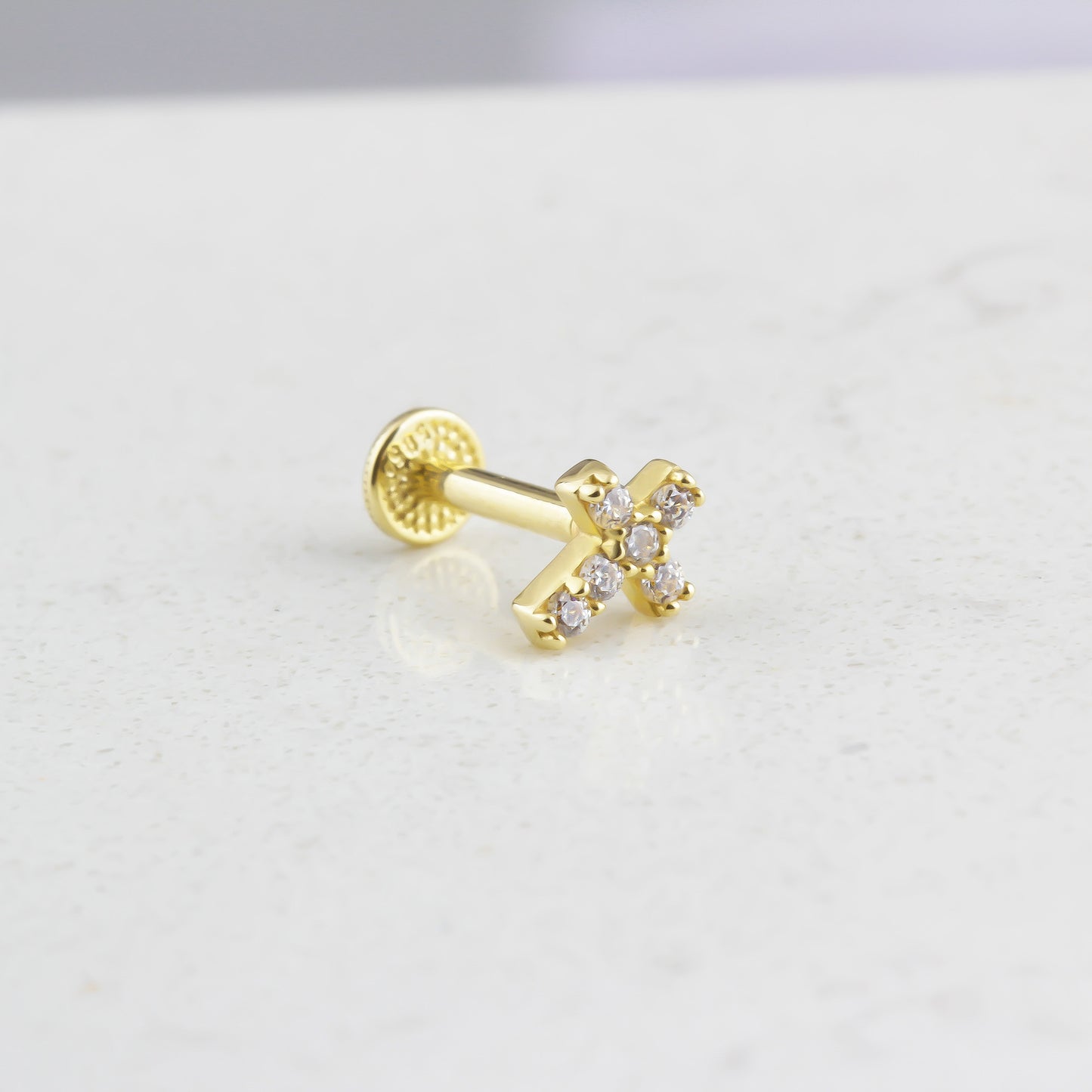 CROSS TRAGUS PIERCING